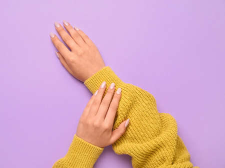 Woman with stylish manicure on color background, closeupの写真素材