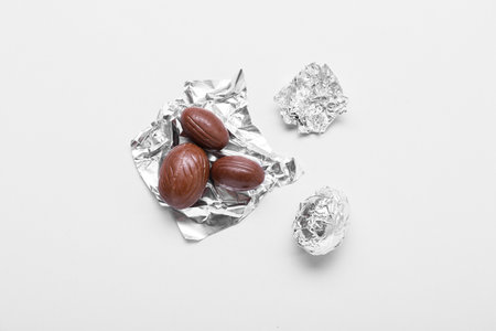 Tasty chocolate eggs isolated on white backgroundの写真素材