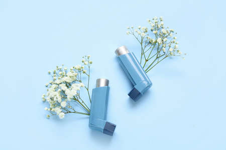 Composition with inhalers and gypsophila flowers on color backgroundの写真素材