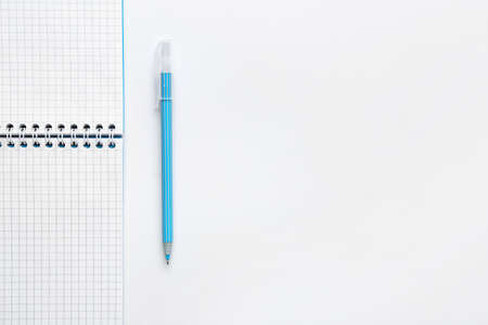 Notebook and pen isolated on white