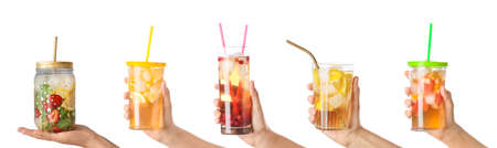 Set of hands with different beverages isolated on whiteの写真素材