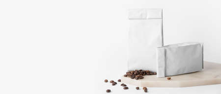 Coffee bags on white background with space for textの写真素材