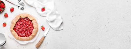 Delicious strawberry galette on light background with space for textの写真素材