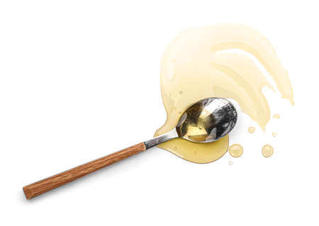 Spoon with tasty maple syrup on white backgroundの写真素材