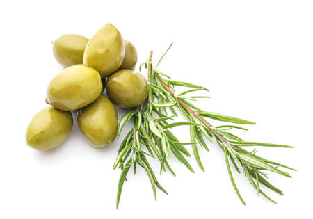 Tasty canned green olives and rosemary isolated on whiteの写真素材