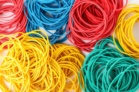 Many colorful rubber bands as background, closeupの写真素材
