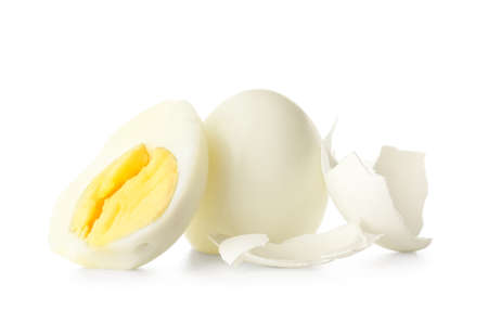 Boiled chicken eggs and shells on white background