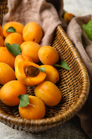 Basket with ripe apricots, closeupの写真素材