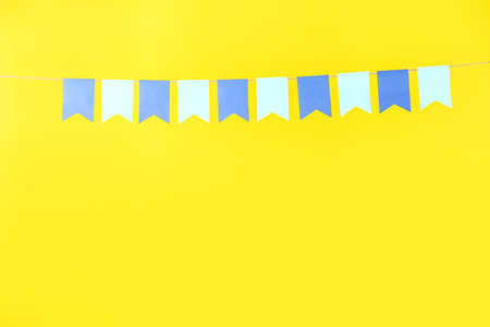 Blue flags for Festa Junina on yellow background