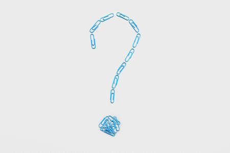 Question mark made of blue paperclips on light backgroundの写真素材