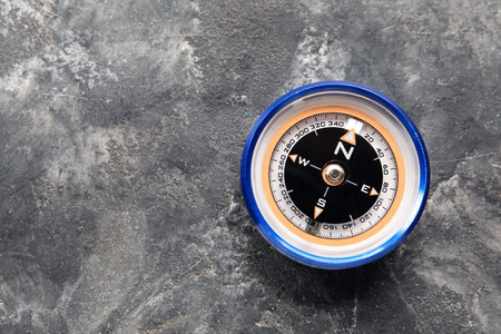 Tourist's compass on grunge backgroundの写真素材