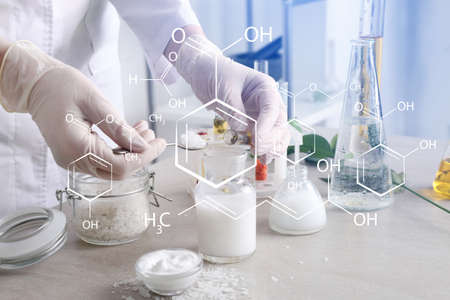 Beautician preparing natural cosmetics in laboratory