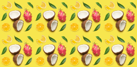 Many tasty tropical fruits on yellow background. pattern for design