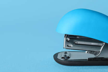 Blue stapler on color background, closeupの写真素材