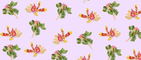 Many tropical flowers on lilac background. pattern for designの写真素材