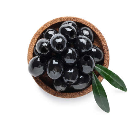 Bowl with black olives on white backgroundの写真素材