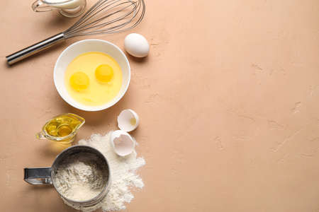 Set of ingredients for baking on color backgroundの写真素材