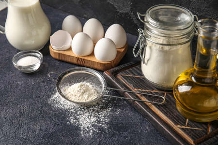 Ingredients for baking on dark tableの写真素材