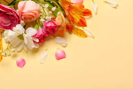 Beautiful flowers on beige backgroundの写真素材