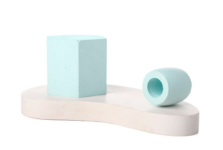 Different decorative podiums for presentation of cosmetic products on white background