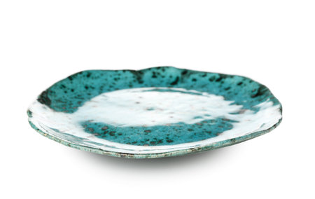 Empty ceramic plate isolated on whiteの写真素材
