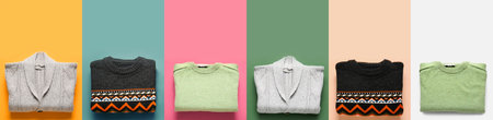 Set of warm knitted sweaters on colorful background, top viewの写真素材