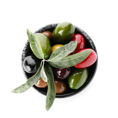 Bowl with different olives on white backgroundの写真素材