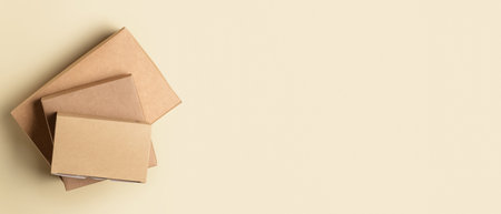 Blank cardboard boxes on light background with space for text, top view