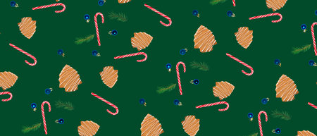 Many gingerbread cookies, candy canes and Christmas decor on green background. pattern for designの写真素材