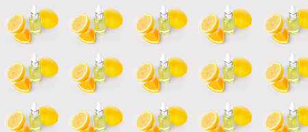 Many bottles of citrus cosmetic serum on light background