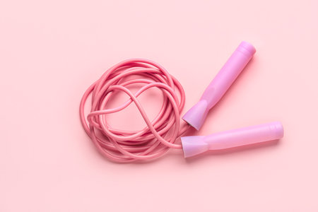 Skipping rope on pink backgroundの写真素材