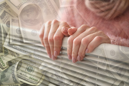 Double exposure of dollar banknotes and woman near electric heater at home, closeup. Concept of heating seasonの写真素材