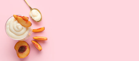 Bowl of delicious pudding and peaches on pink background with space for text