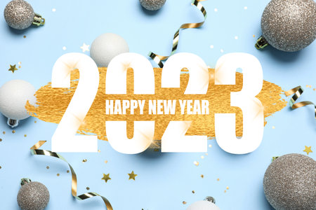 Beautiful New Year greeting card with Christmas balls and confetti on light blue backgroundの写真素材