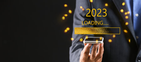 Businessman with mobile phone on dark background. Concept of New Year 2022