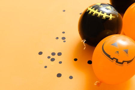 Halloween balloons on color background, closeupの写真素材