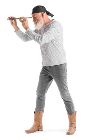 Mature bearded man dressed as pirate with spyglass on white backgroundの写真素材