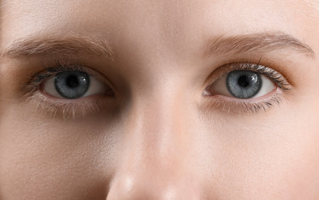 Young woman with blue eyesの写真素材