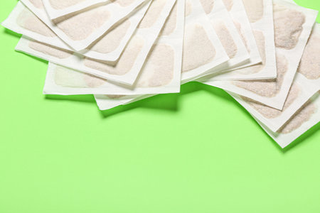 Mustard plasters on green backgroundの写真素材