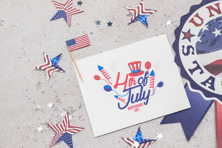 Greeting card for Independence Day, USA flag, stars and confetti on light backgroundの写真素材