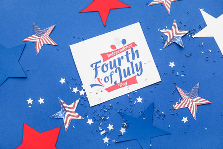Greeting card for Independence Day, stars and confetti on blue backgroundの写真素材
