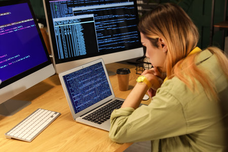 Transgender programmer working in server roomの写真素材