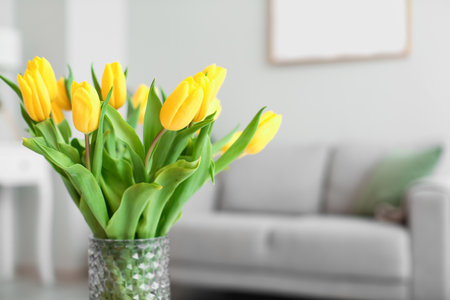 Vase with tulips in living room, closeupの写真素材