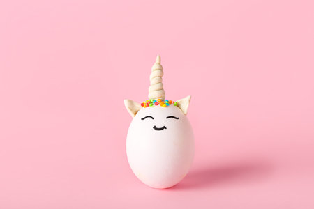 Unicorn made of egg on color background. easter celebrationの写真素材