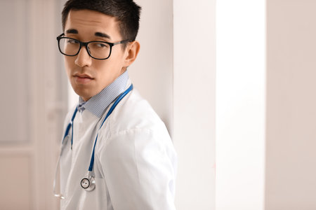 Male Asian doctor worrying at hospitalの写真素材