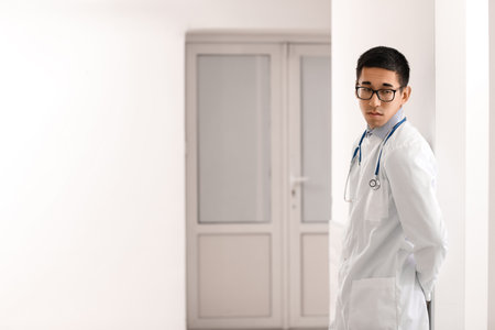 Male Asian doctor worrying at hospitalの写真素材