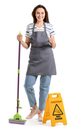 Young woman with floor mop showing thumb-up on white backgroundの写真素材