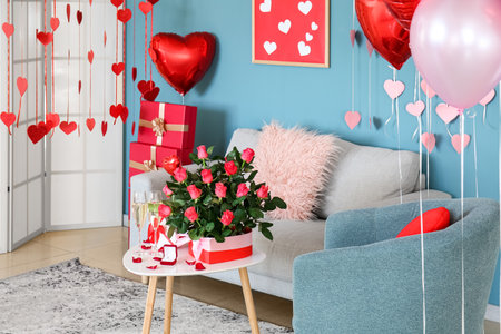 Interior of beautiful living room with sofa, armchair and decor for Valentine's Dayの写真素材