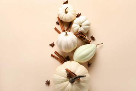 Composition with Halloween pumpkins and spices on color backgroundの写真素材
