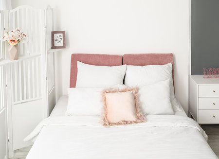 Interior of modern bedroom with stylish folding screenの写真素材